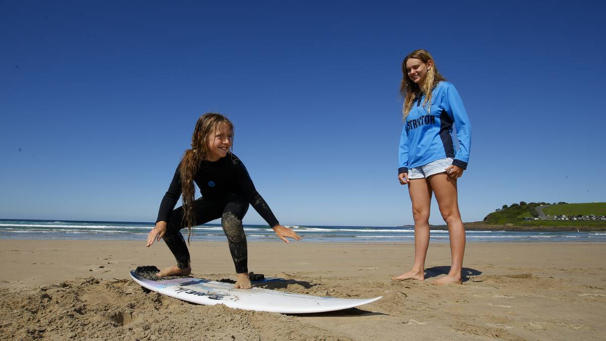 Hang ten: Why not take a lesson at one of the many surf schools in the Illawarra, such as Pines Surfing Academy. Picture: Anna Warr 