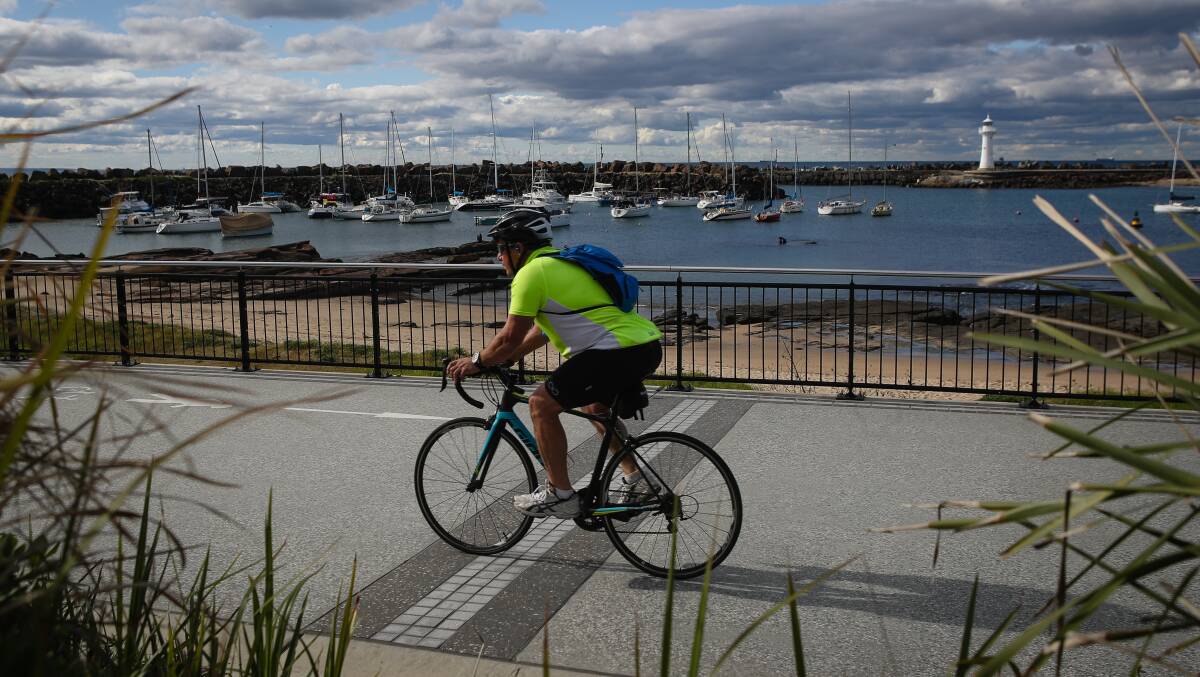 Sharing the path: A cyclist on the Blue Mile shared pathway near Wollongong Harbour. Picture: Adam McLean.