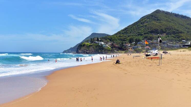 Escarpment location: Stanwell Park beach the most northern patrolled beach in Wollongong. Picture: Visit NSW 