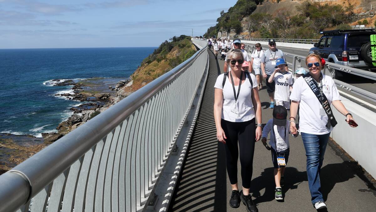 Great view: Walking across the Sea Cliff Bridge is a great way to take in the view. Picture: Adam McLean