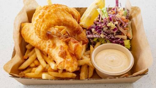 Harbourfront location: The Beer Battered Fish 'n' Chips at Penny Whistlers cafe at Kiama. Picture: Penny Whistlers