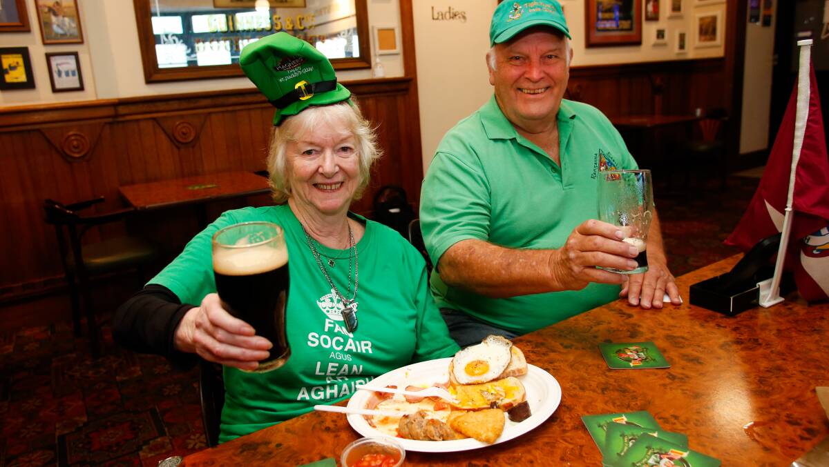 Luck of the Irish: St Patrick's Day is an all-day affair at Dicey Riley's Hotel in Wollongong. Frances Love and Ian Kirby are pictured enjoying a Guinness at last year's event. Picture: Anna Warr