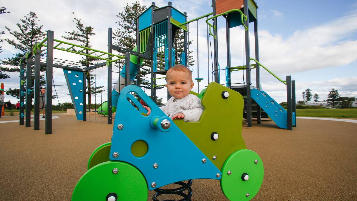 Big hit: 11-month-old Chari Romero tries out the new play equipment. Picture: Anna Warr