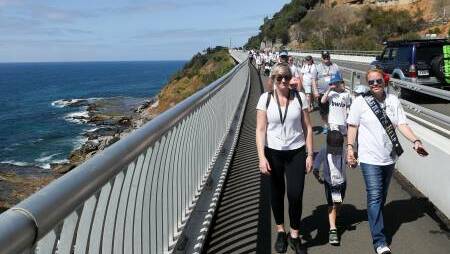 Great view: Walking across the Sea Cliff Bridge is a great way to take in the view. Picture: Adam McLean 
