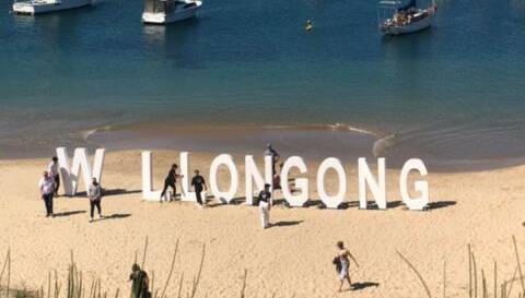 New initiative: Letters spelling out 'Wollongong' were moved into place on Sunday. Pictures: Jeremy Lasek 