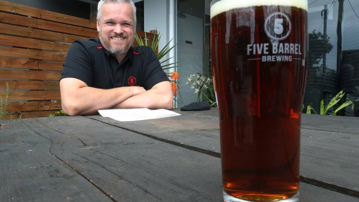 Five Barrel Brewing's co-owner Tim O'Shea enjoys a beer from the award-winning brewery. Picture: Robert Peet