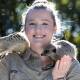 Animal adventure: Zookeeper Alanna McTaggart in the meerkat enclosure at Symbio Wildlife Park. Picture: Robert Peet