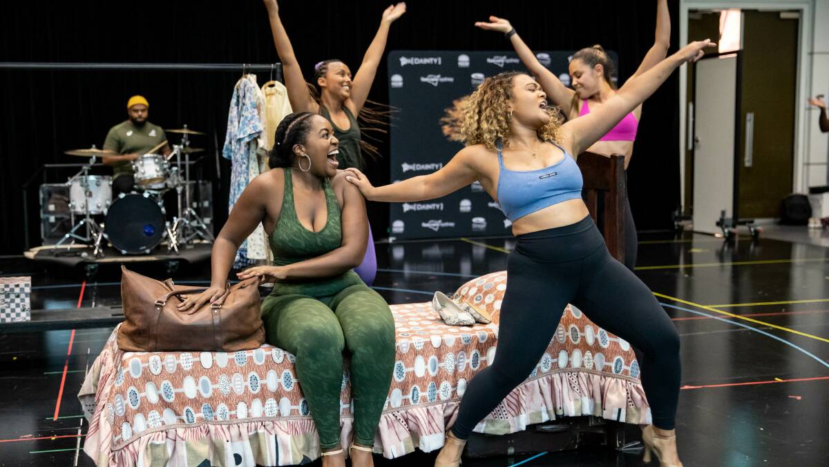 The cast, including Ruva Ngwenya, left, who plays the title role, in rehearsals in Sydney. Picture: David Hooley