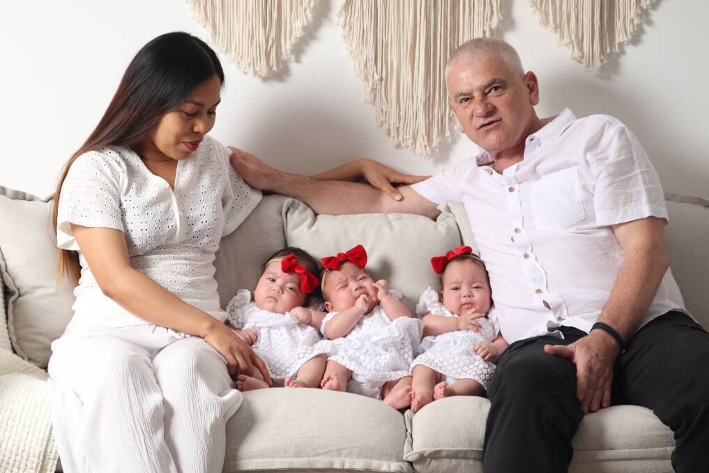 Flora Belle Polangco and Peter Stavropoulos with their triplets Isabella, Ariana and Maria-Alexa. Picture by My Little Photography Illawarra.