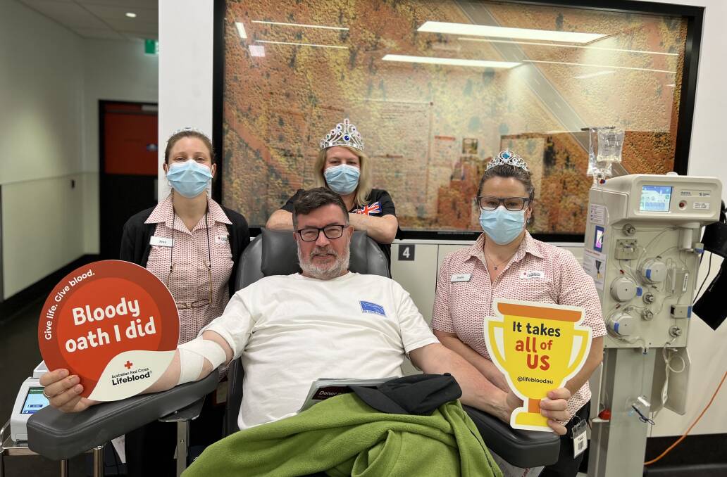Wollongong Lifeblood employees Jess, Jo and Jodie with donor Philip Walls. Picture:Supplied