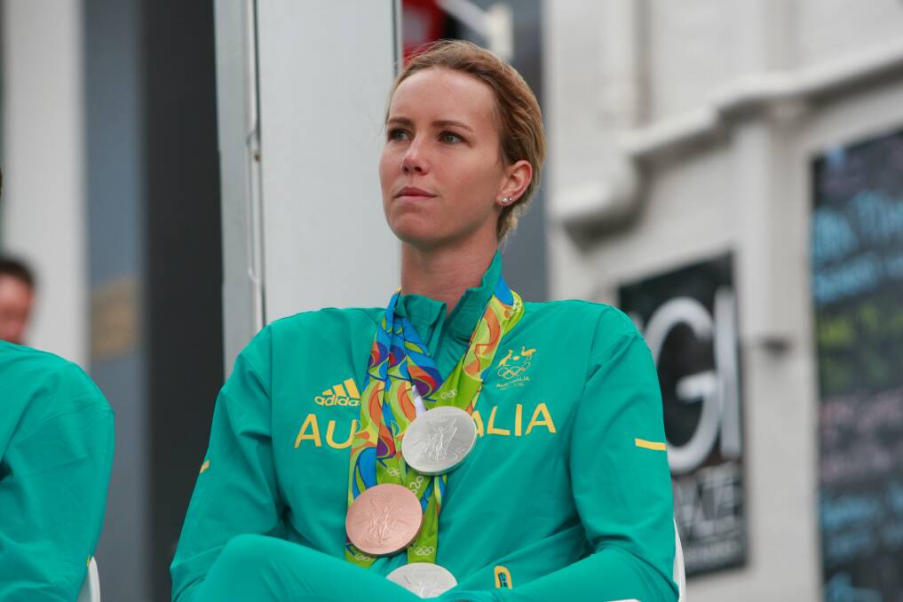Illawarra swimmer Emma McKeon celebrating her Olympic wins in Crown Street in 2016. The swimmer's picture has been used by lobby group Advance in a campaign against transgender sport inclusion. Picture:Georgia Matts