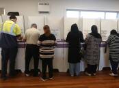 CASTING A VOTE: Illawarra residents vote at the Cringila Community Centre on election day 2019. Picture: Robert Peet