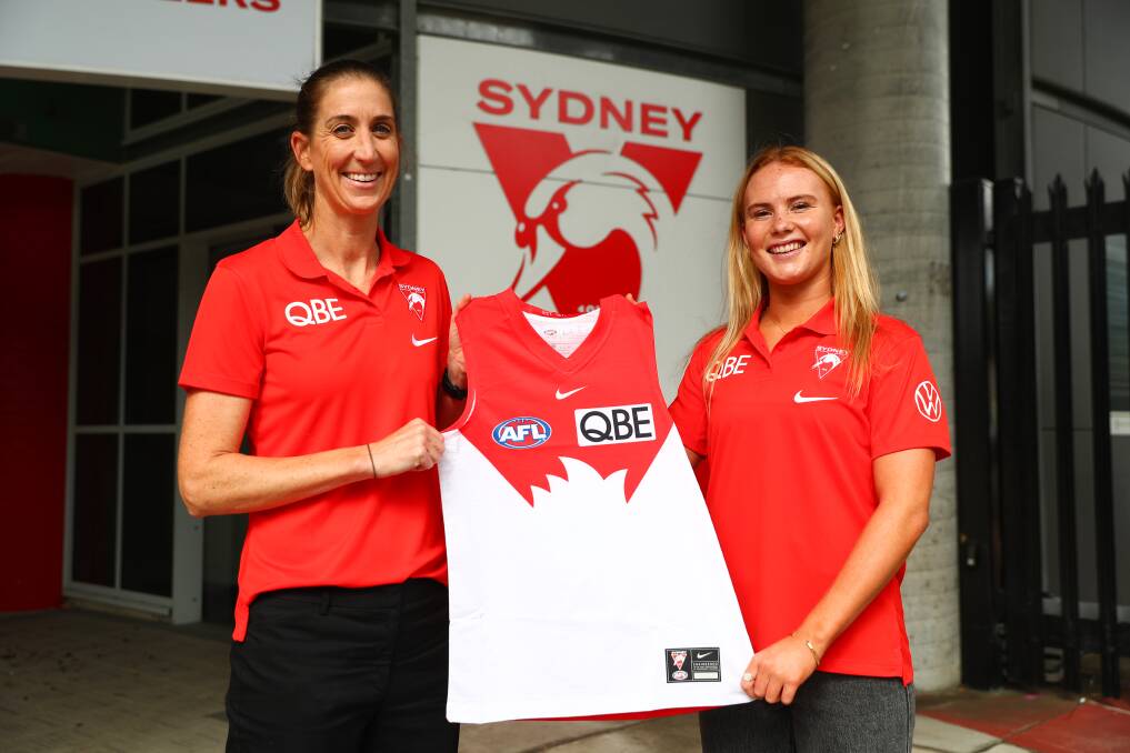 Ruby Sargent-Wilson receiving her Swans guernsey. Picture:Supplied