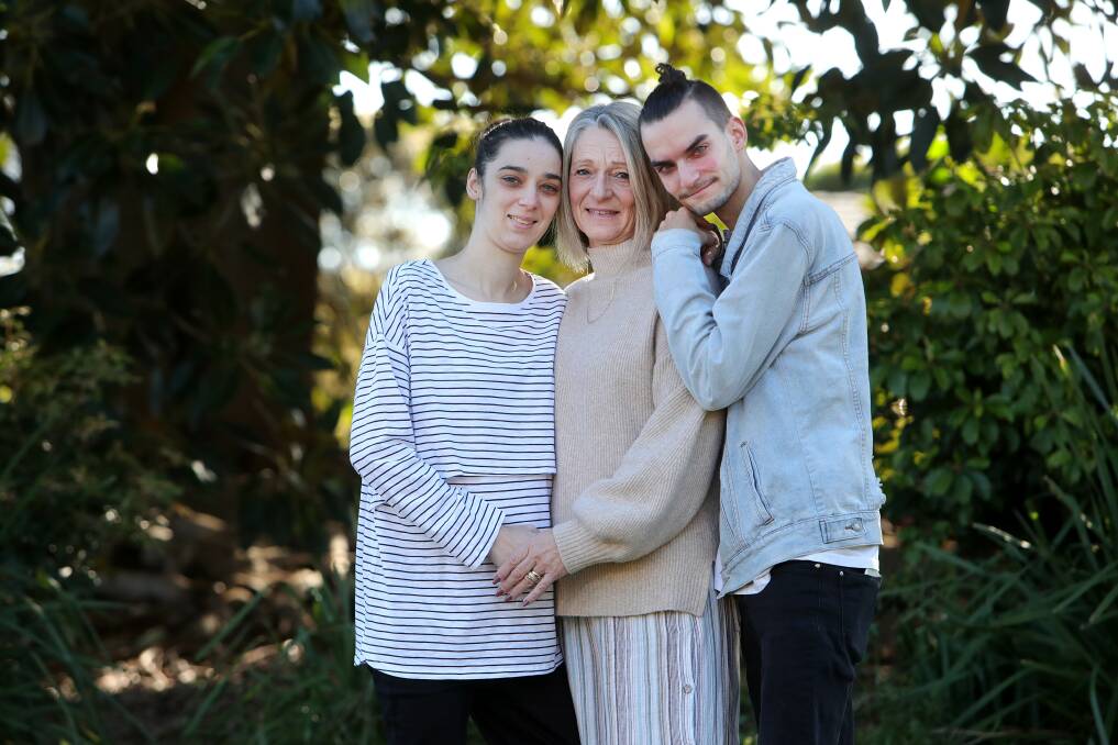 Foster carer Amanda Phillips with her foster daughter Stacey Naylor-Hosa and her brother Blade Naylor-Hosa. Picture: Sylvia Liber