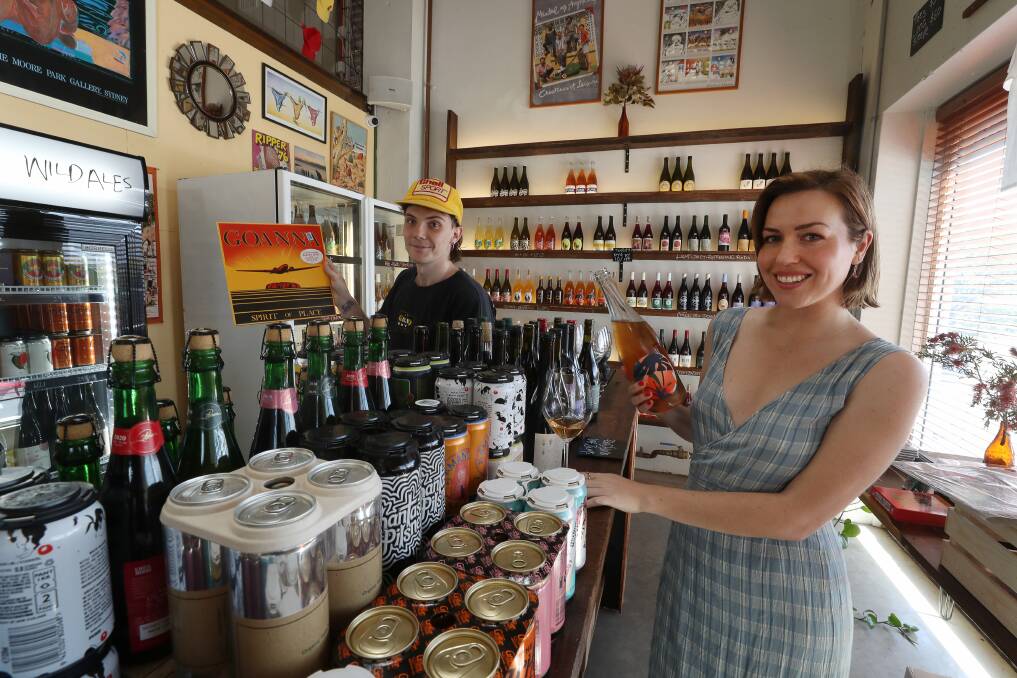 James Sherley and Chelsea Smith at their new store Yakka, which stocks alcohol, local produce and vinyl records in Port Kembla. Picture: Robert Peet