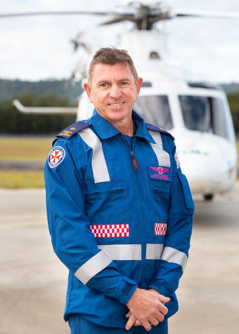 Wayne Cannon, is a team leader at the Albion Park TOLL rescue base. He's pictured here in front of his work transport. Picture: Courtesy of TOLL