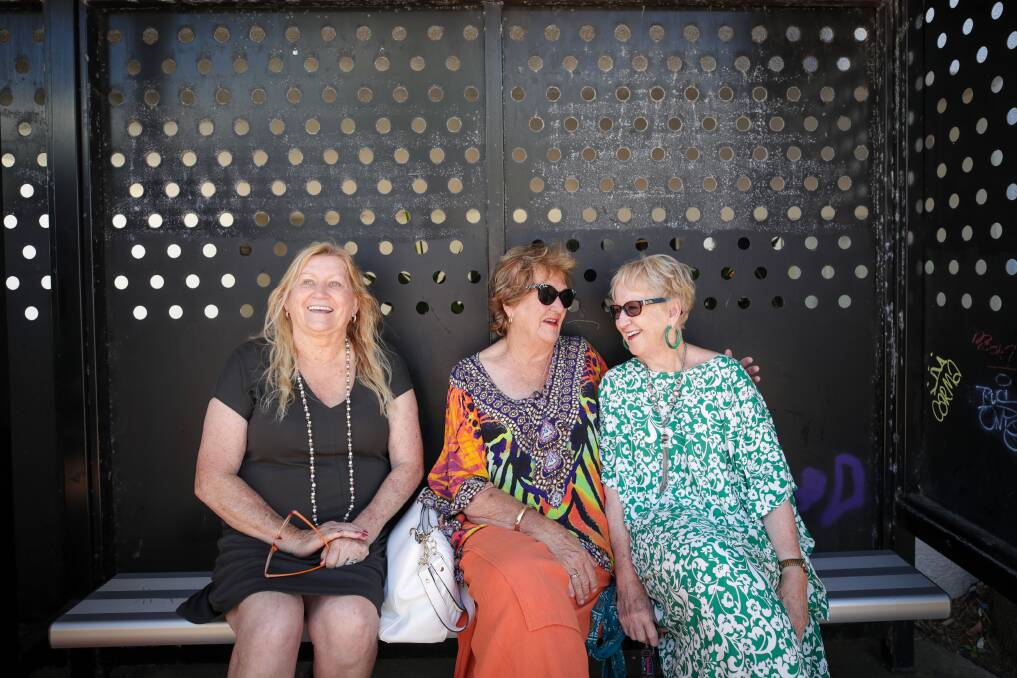 Jean Mills, Yvonne Wooldridge and Kerrie Foster waiting for the Beach Bus at North Wollongong. Picture by Adam McLean.