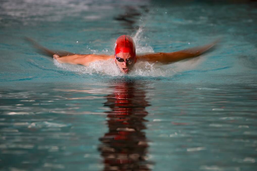 Olympian Emma McKeon training at her parents' swim school pool in Unanderra. Picture:Adam McLean.