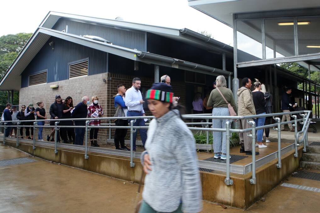 Voters queue at Wollongong Public School. Picture: Sylvia Liber