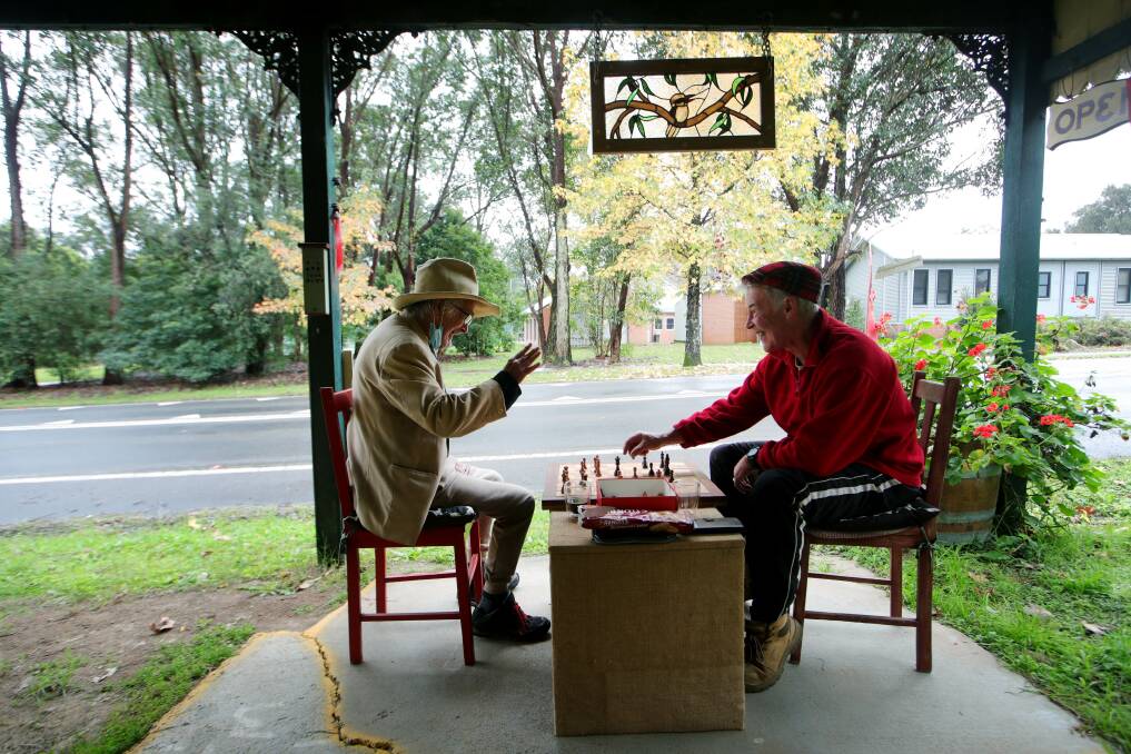 Lance Brown playing his Wednesday chess game with friend and fellow local Sean Kramer. Mr Brown surrendered and Mr Kramer took the Wednesday crown. Picture:Sylvia Liber