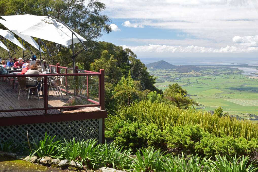 CLEAR ACCESS: Access to Cambewarra Mountain and Kangaroo Valley has reopened to all traffic, with an escort on Moss Vale Rd. Local businesses like The Lookout cafe are urging visitors to return and shop local.