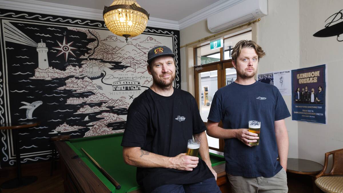 Damien Martin owner brewery/chef at The Milton Hotel with Dean Pitt venue manager and chief beer taster with freshly poured schooners of Dangerous Ale. Picture by Keegan Carroll
