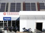 City Coast Motorcycles Wollongong installed 40 solar panels on their roof ten years ago. Picture: Adam McLean