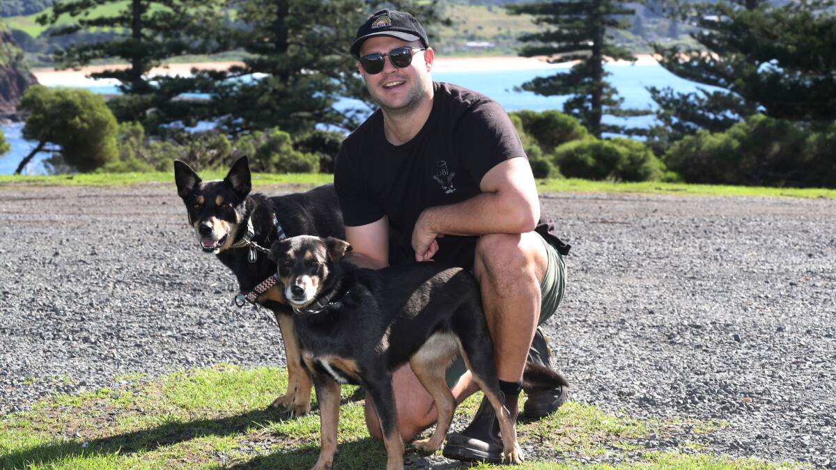 WAGGING TAILS: Patty O'Keefe with George and Maggie at Kiama