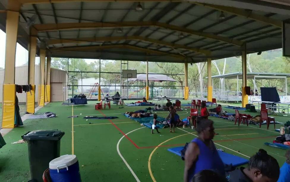 When Timber Creek flooded in 2023, locals were forced to take shelter in the town's open basketball court - battling the heat and humidity of a tropical wet season and hoping their makeshift 'evacuation centre' would not flood too. 
