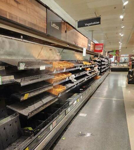 Supermarket shelves have been stripped bare in the Top End as all major freight routes are cut by floodwaters. 