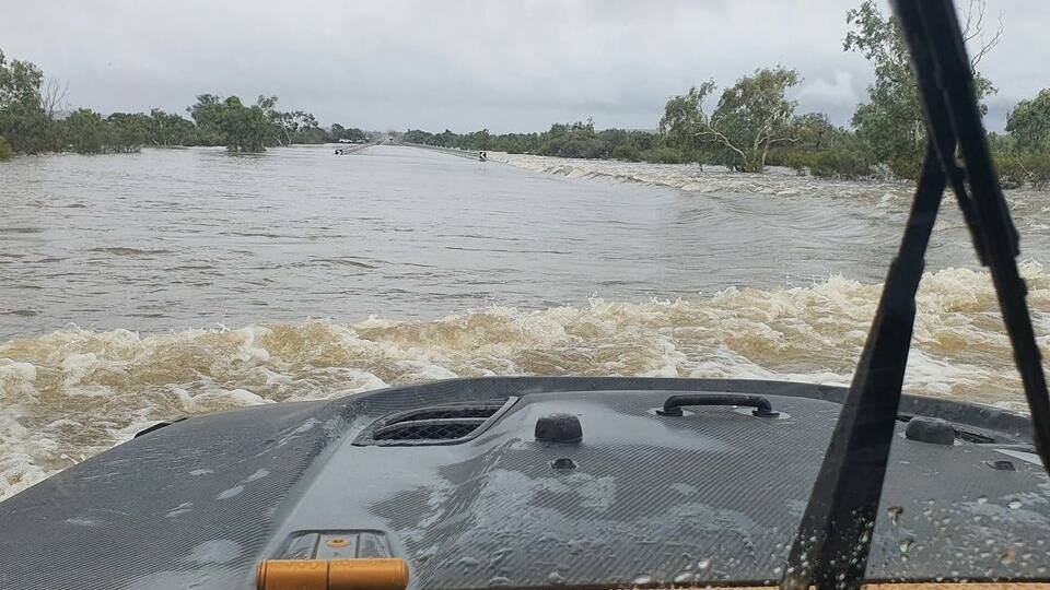Snap warning: reports of crocs on flooded NT highway