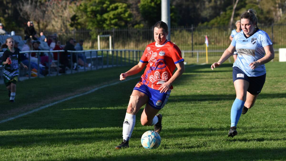 White Eagles captain Brittany Ring takes the ball up the field in their earlier season win against Kiama. Picture by Kiah Hufton/Soccer Shots Illawarra 