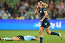 Figtree junior Mackenzie Hawkesby celebrates another championship with Sydney FC. Picture - Kelly Defina/Getty Images
