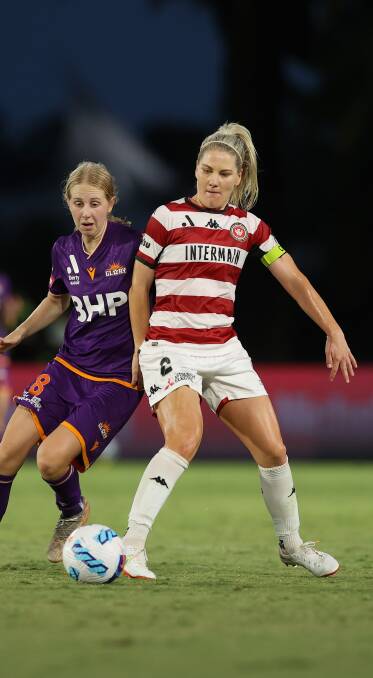 Cooper battles for the ball against Perth Glory midfielder Hana Lowry. Picture by Getty Images