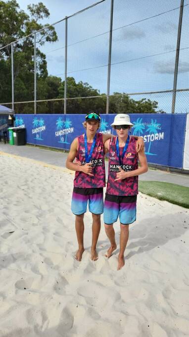 Adax Brienen and Adam Fejes after claiming gold in Brisbane. Picture - supplied
