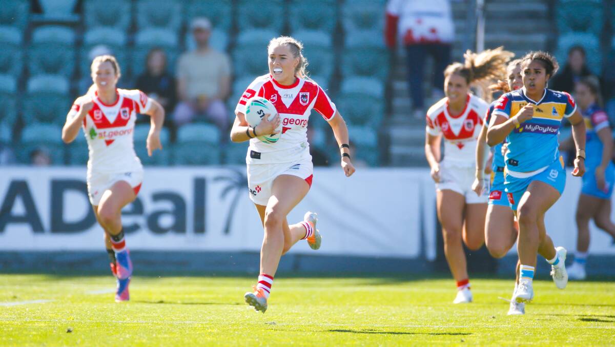 Electrifying: Teagan Berry raced 90 metres in Wollongong to score her second try against the Titans. Picture: Anna Warr