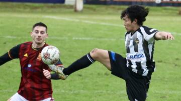 Tetsunari Nishimura (right) was on fire as Port Kembla downed Cringila 4-1 in round 12 action of the Illawarra Premier League. Picture by Adam McLean