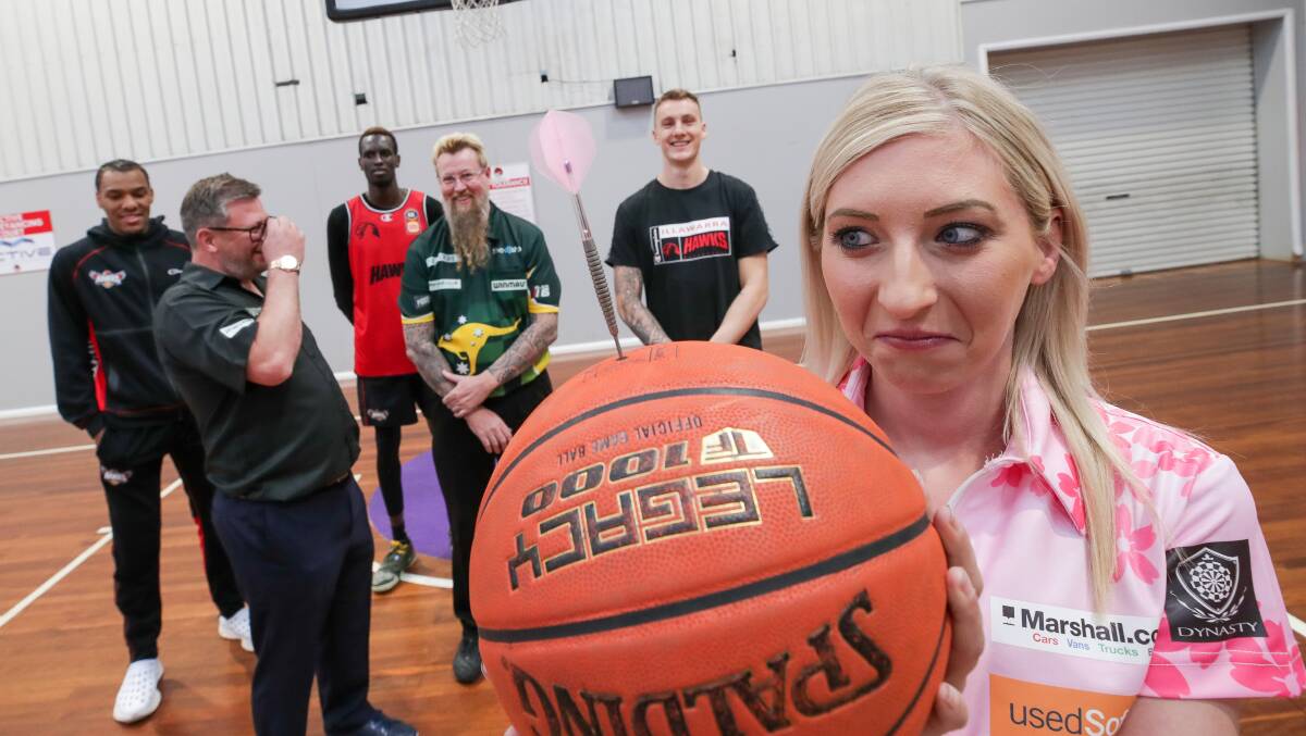 Cross-codes: Sherrock at a meet-and-greet with the Illawarra Hawks on Thursday. Picture: Adam McLean