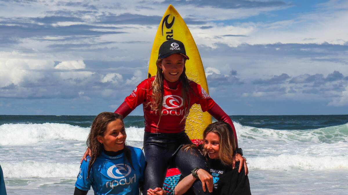 Lucy Darragh was on top of the world after claiming the U-14 girls title. Picture by Patrick Bond