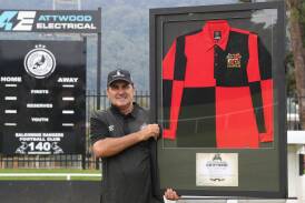 Balgownie Rangers FC president Steve Buckley proudly holds the Club of Pioneers jersey at Judy Masters Oval. Picture by Robert Peet