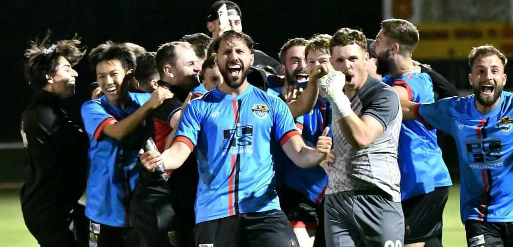 Scenes of elation for District League side Shellharbour after Blake Coad's penalty save meant the side progressed to the next stage of the Australia Cup. Picture by Richie Wagner