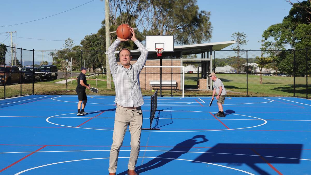 Shellharbour Mayor Chris Homer shooting for the hoop whilst keen pickleball players Carlo Napolitano (left) and Warwick Lindsay test out Barrack Point's brand new court. Picture by Sylvia Liber