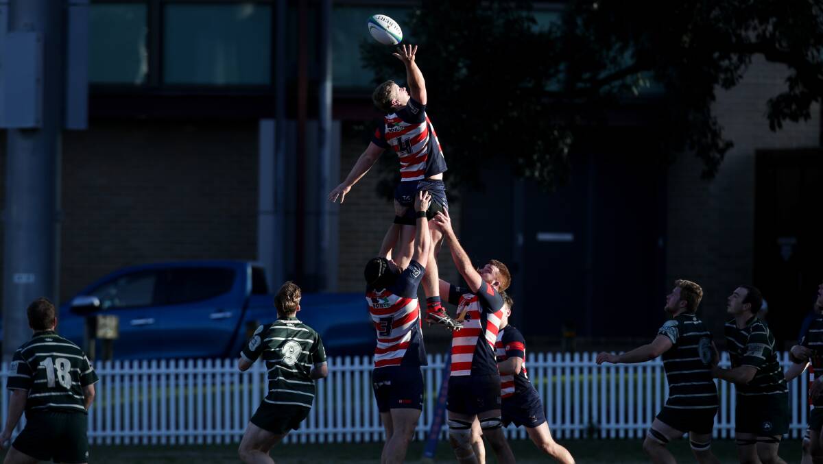 Rising high: University's Lincoln Thompson getting up to claim the ball. Picture: Adam McLean