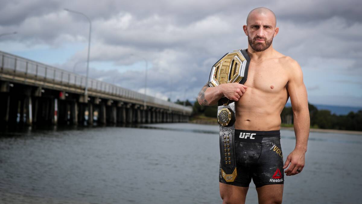 Alex Volkanovski next to the Windang Bridge which is close to where he grew up earlier this year. Picture by Adam McLean