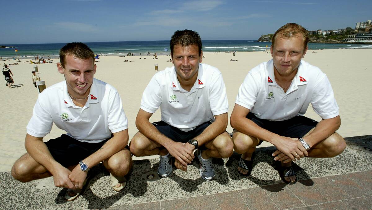 Stephen Laybutt (right) with fellow Illawarra products Luke Wilkshire and Mile Sterjovski, pictured with the Socceroos in 2004. Picture by Greg Totman