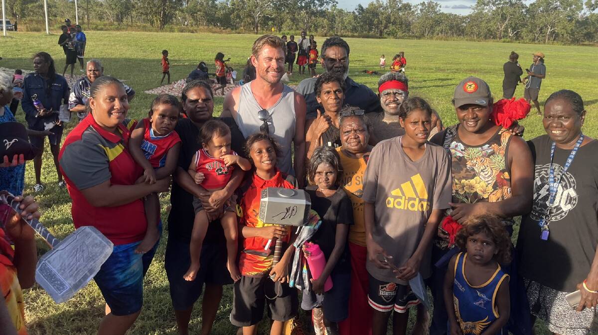 Chris Hemsworth surrounded by fans from Bulman, NT. Picture by Annie Hesse