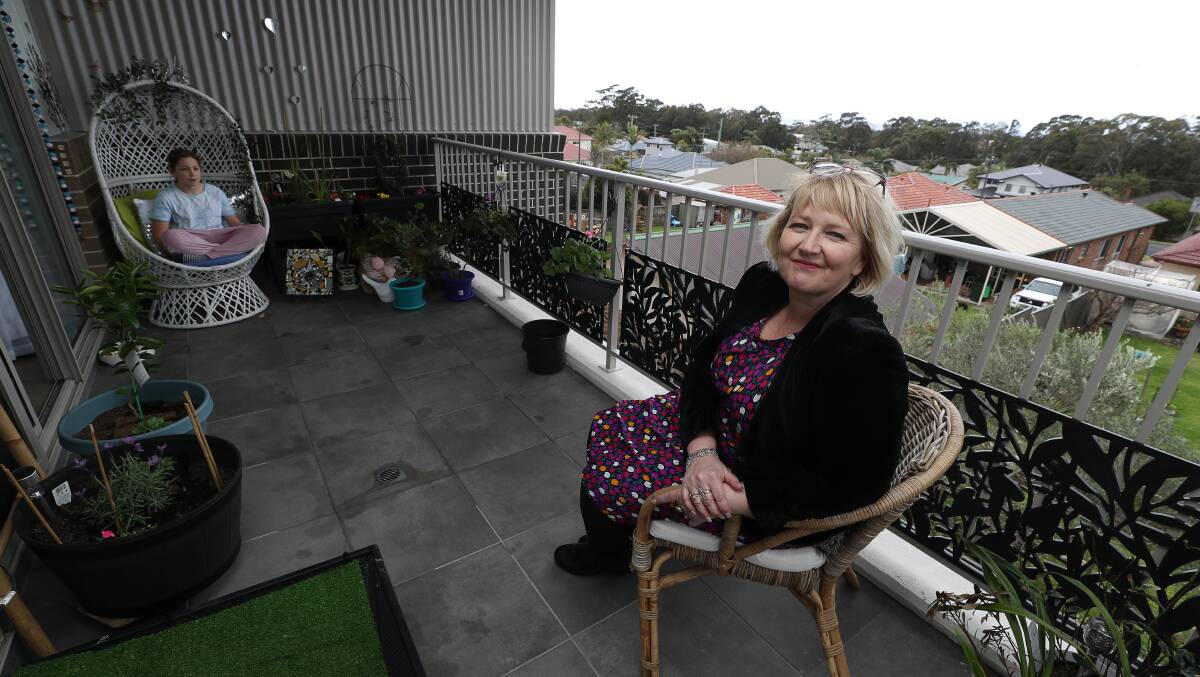 Home: Joanne Fisher and daughter Eva in new Illawarra Housing Trust unit. Picture: Robert Peet.