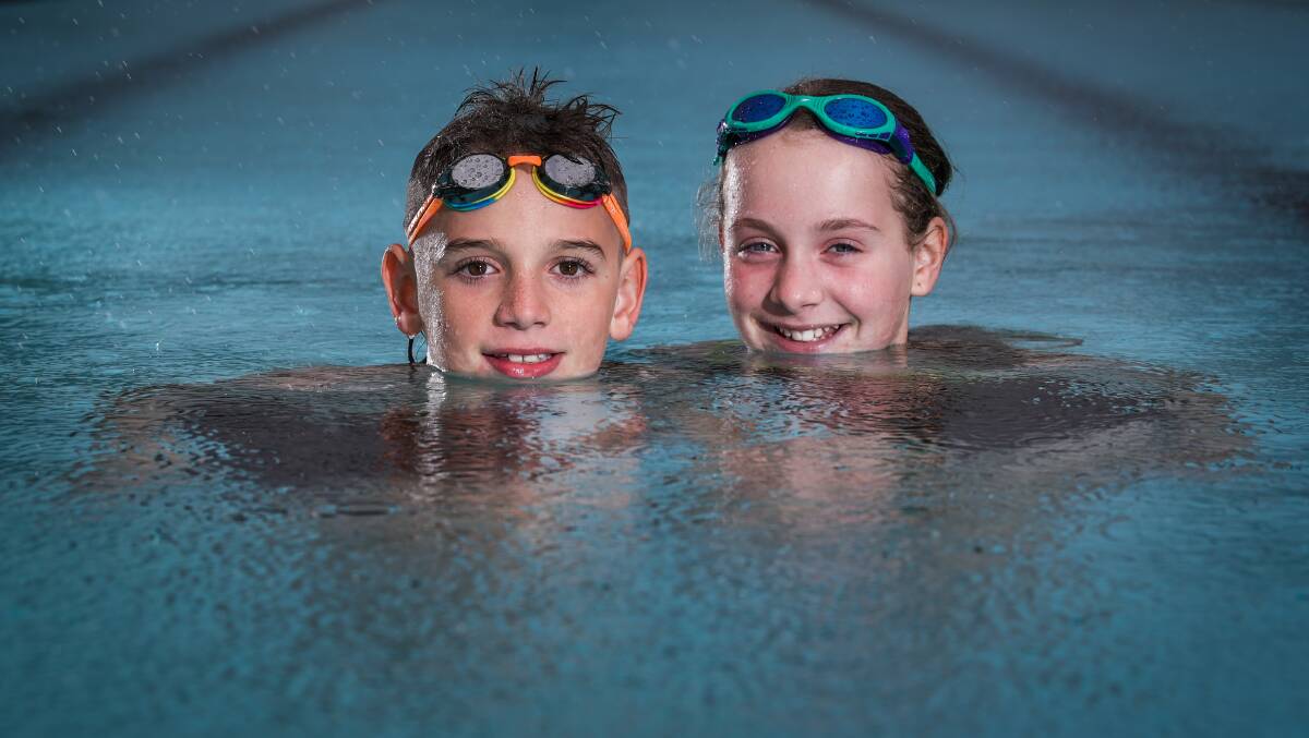 Angus and Penelope Thompson will be swimming 18km to help raise funds for women in Africa. Picture by Adam McLean