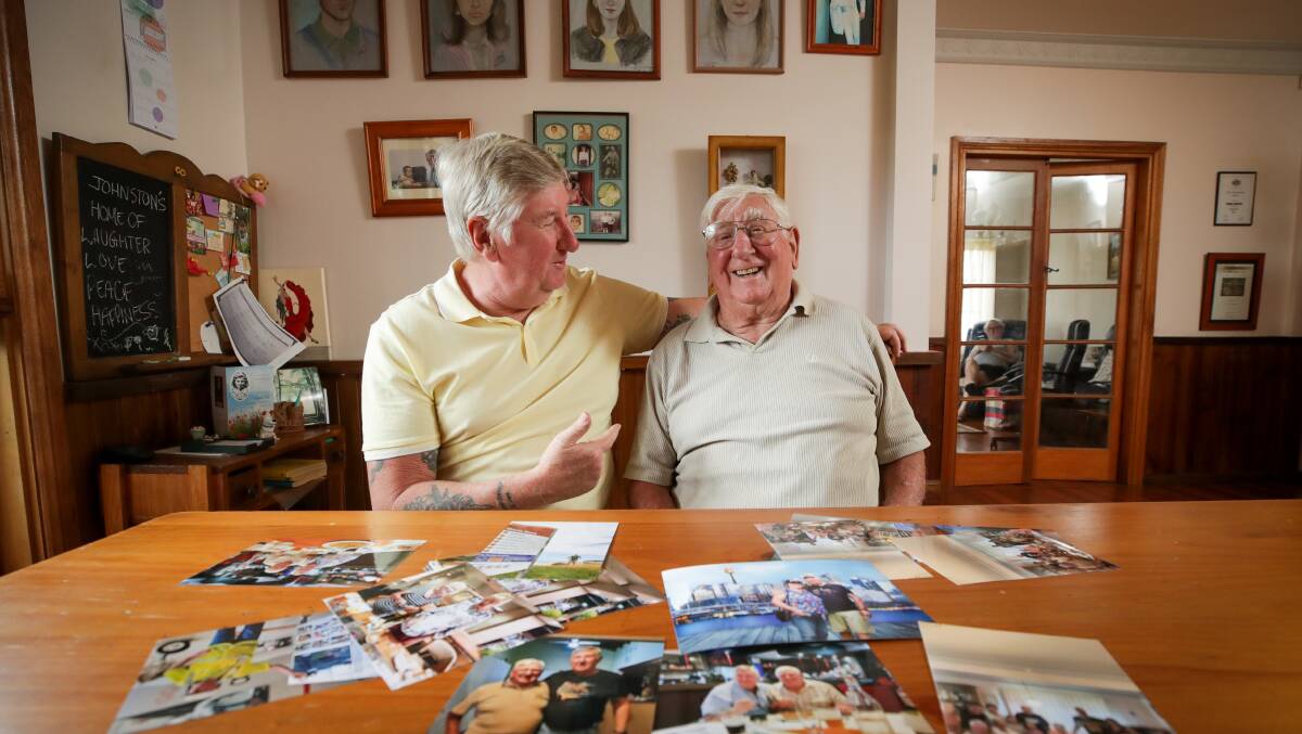 Andrew Baker (L) with father Roy Baker (R) reunited after 60 years. Picture by Adam McLean
