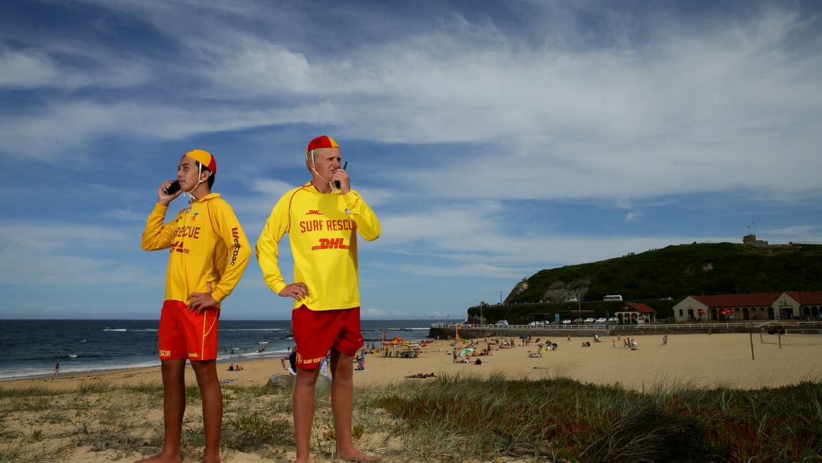 Surf lifesavers on Nobbys Beach, Newcastle. Picture by Jonathan Carroll 
